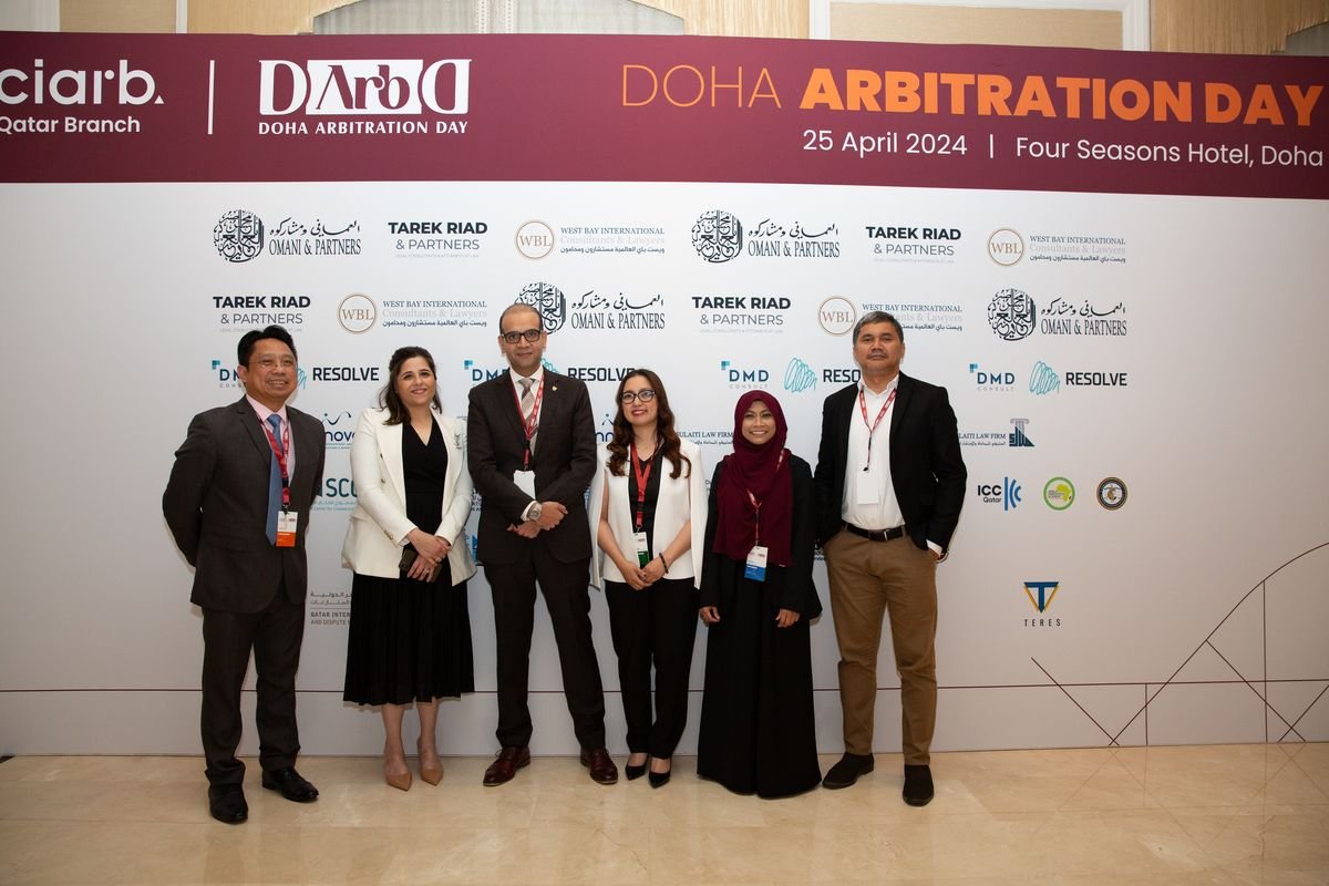 Institutional group photograph at the 1st Doha Arbitration Day